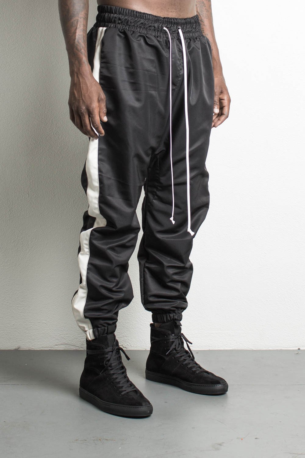 parachute track pants in black/natural by daniel patrick tzfiqlq