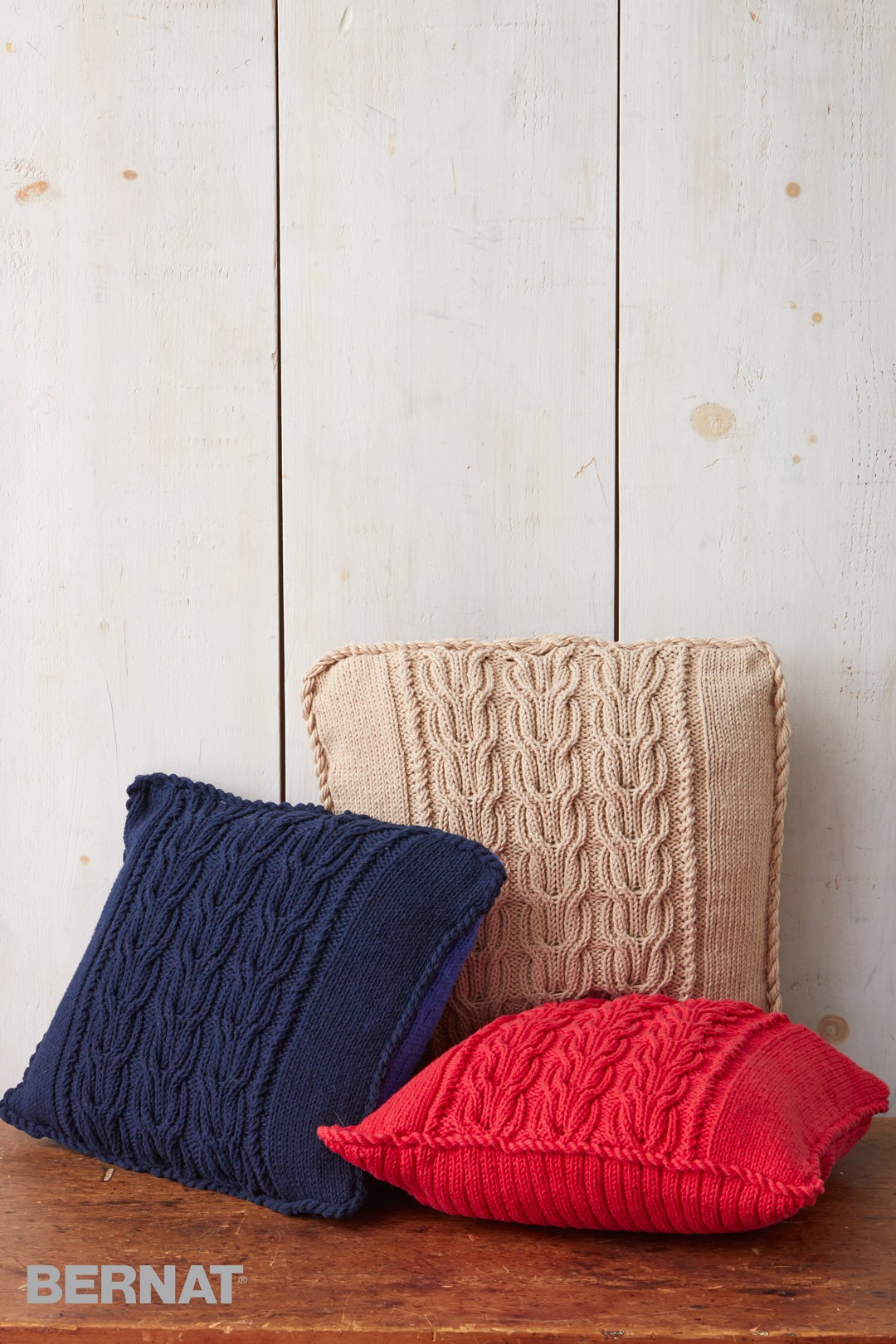 bernat patterns cable knit trio pillows. bernat pydrudo