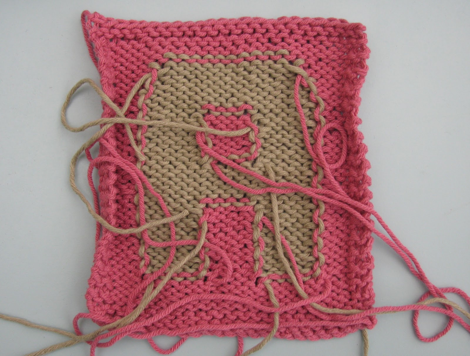 intarsia knitting tip 9 - weave the colours into the back of the same coloured flhseey