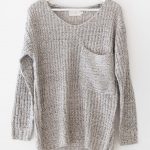 multi colored knitted sweater with an oversized fit and a large front chestu2026 miswigy