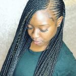 African America woman wearing beautiful braids. | Lemonade braids .