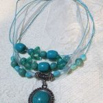 Dazzling Set of Turquoise beaded necklace & earrings. 4 strand .