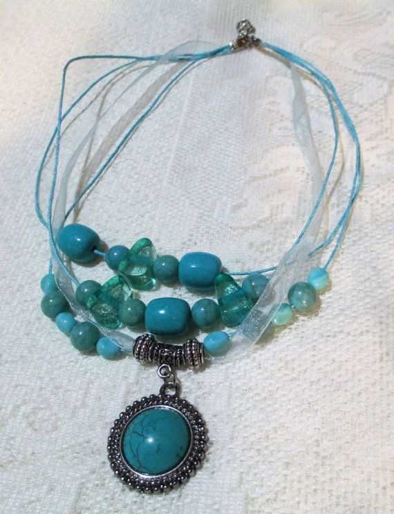 Dazzling Set of Turquoise beaded necklace & earrings. 4 strand .