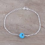Sterling Silver and Composite Turquoise Pendant Bracelet - Stylish .
