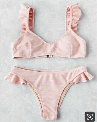 Light pink ruffle bikini set size small super cute flattering .