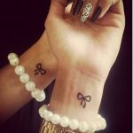 small bow tattoo: … | Small girly tattoos, Friend tattoos small .