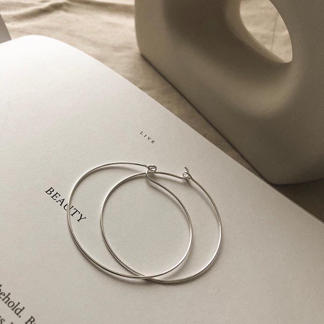 product photography, minimalist jewelry flatlay, minimalist .