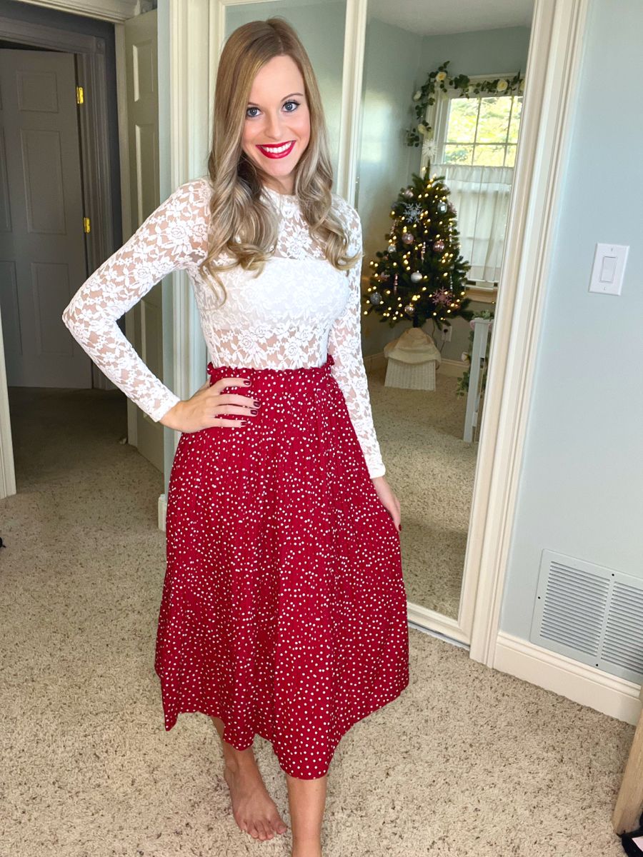 Look cute with the red and white polka
dot skirt