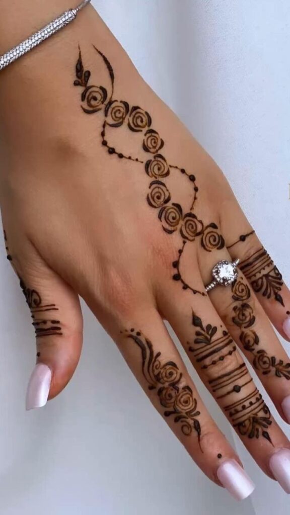 1696861253_Back-Hand-Henna-Designs.jpg