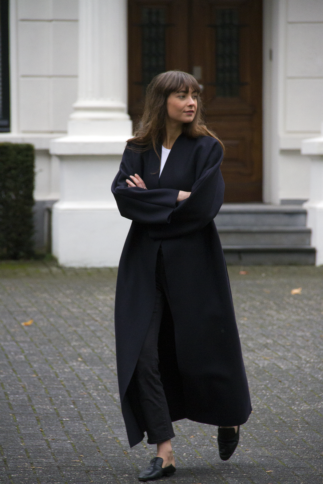 Look Chic and Sophisticated in a Stylish
Long Black Coat: Timeless and Versatile