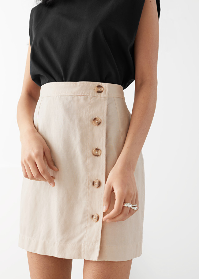1696887698_Button-Front-Skirt-Outfits.png
