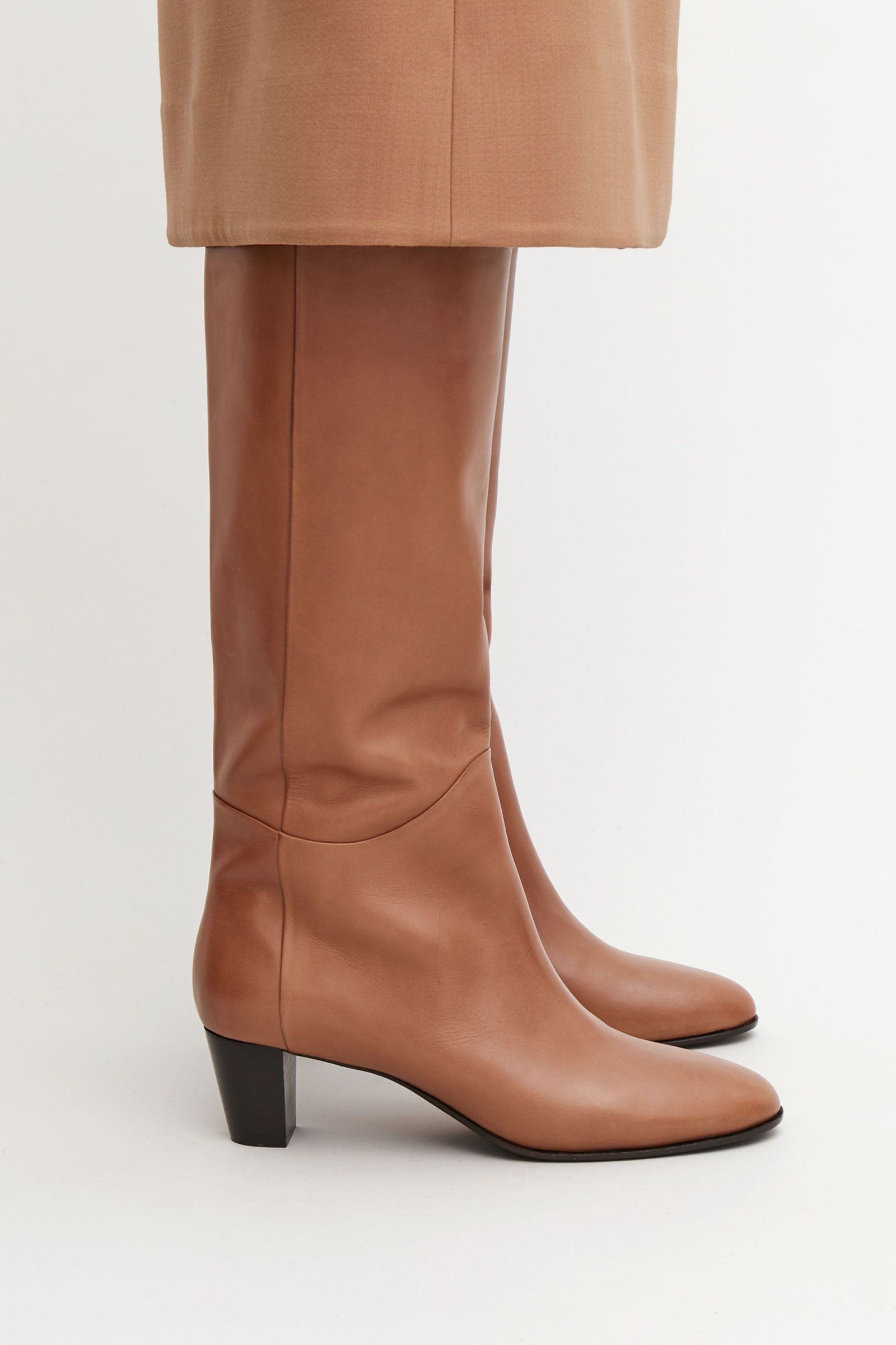 Knee High Cognac Boots- a perfect
selection for riding