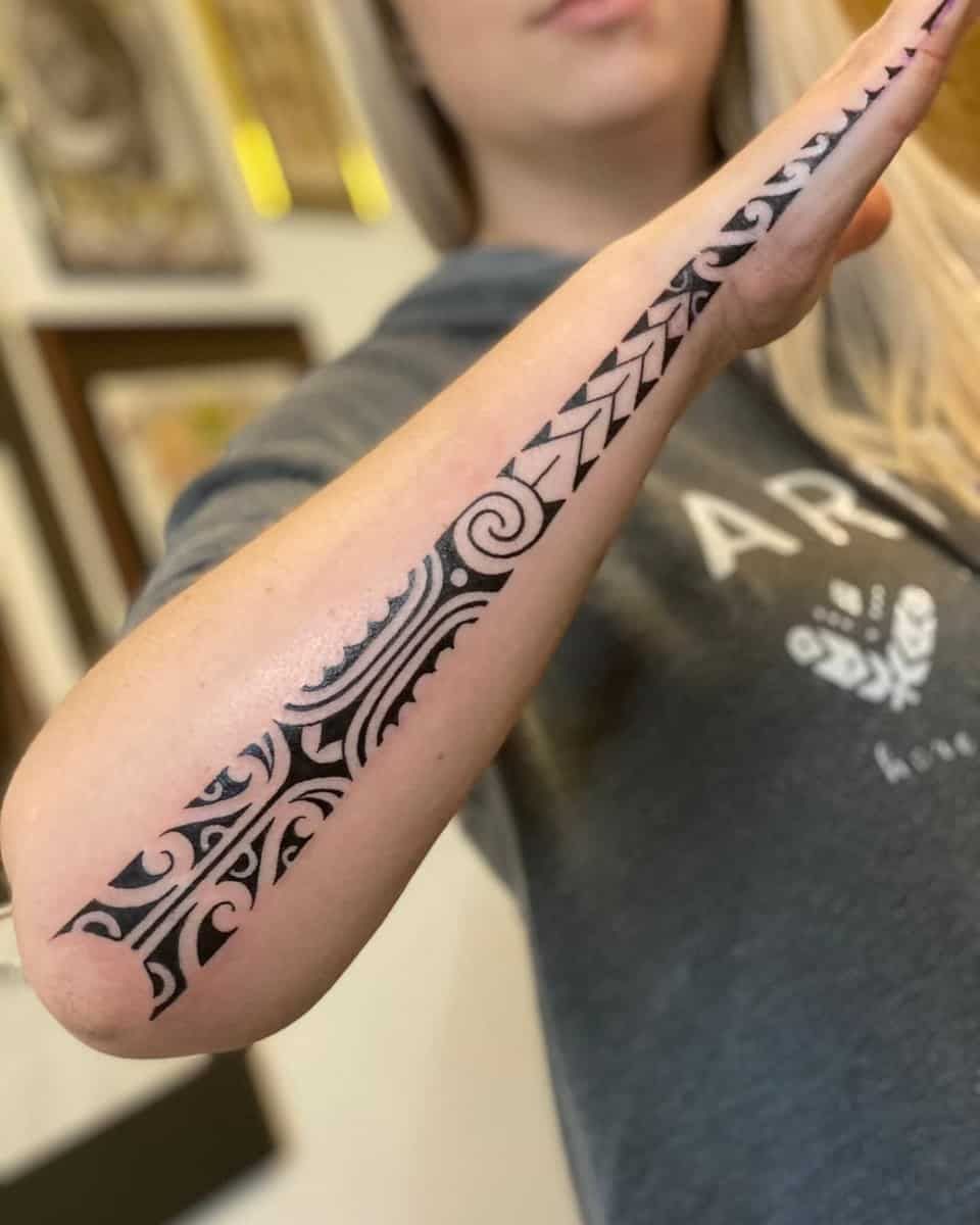 Bold Tribal Tattoo Designs for Women