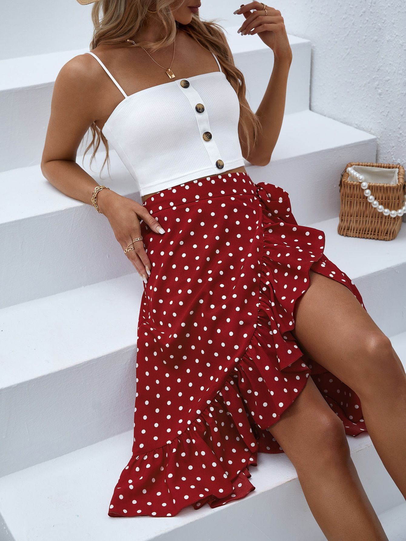 Look cute with the red and white polka
dot skirt
