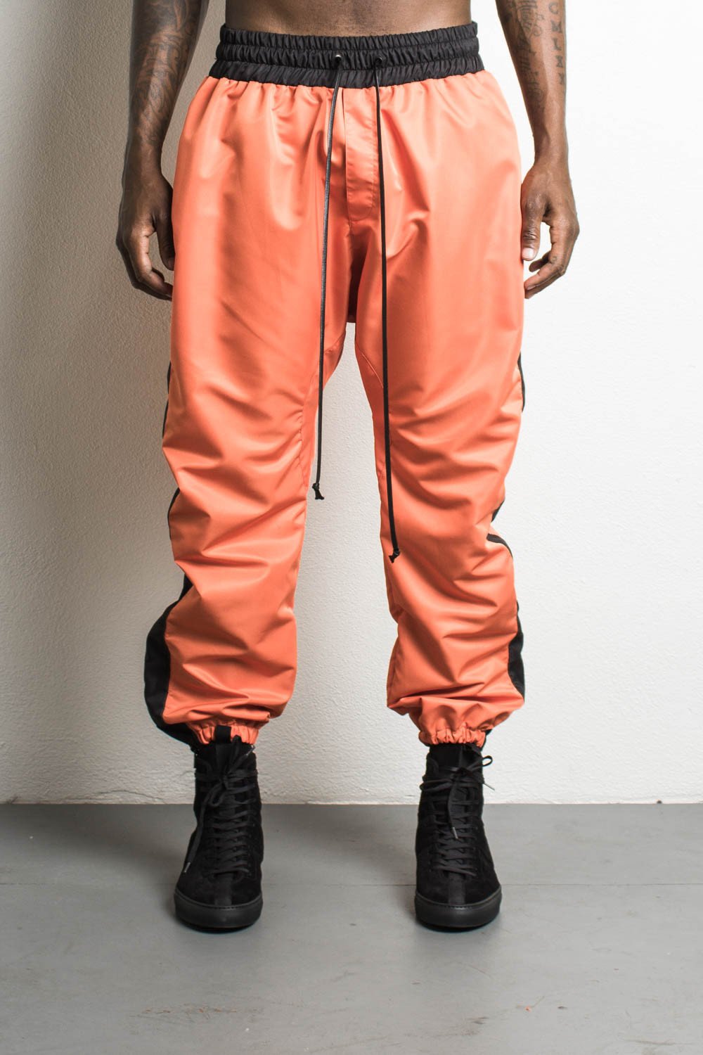 parachute pants orange/black oxipueu