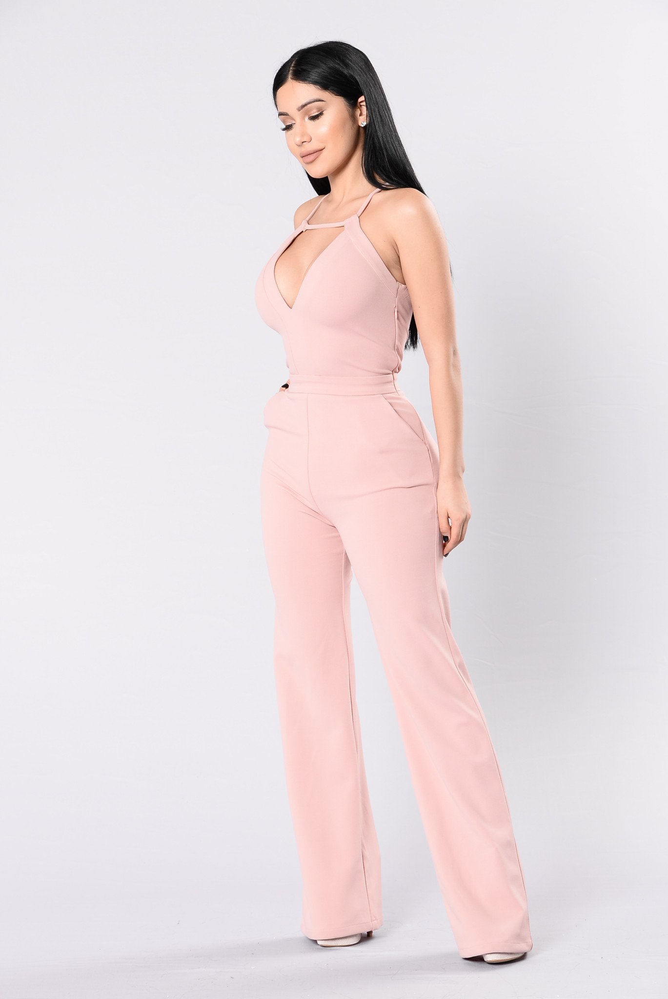 The childlike look in a pink jumpsuit
