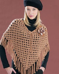 crochet poncho pattern 19): this crochet poncho has an open pattern which creates a fishnet look icylyjo