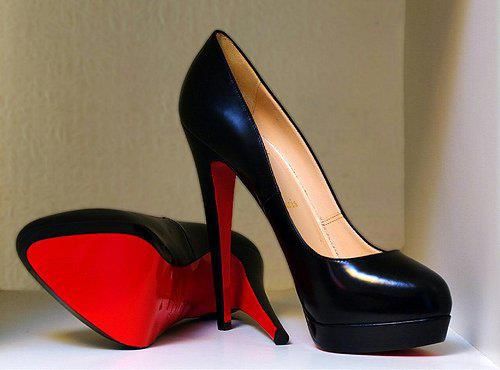 Every classy woman should own a pair of black patent leather red