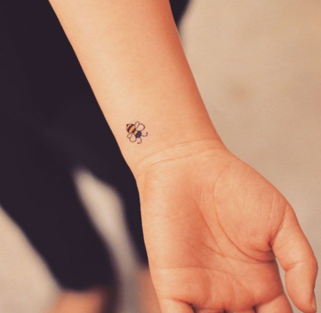 Tiny Bumble Bee Tattoo on Wrist by Grain | Animal tattoos for .