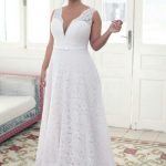 Elegant lace champagne plus size wedding gown creation. Comes with .