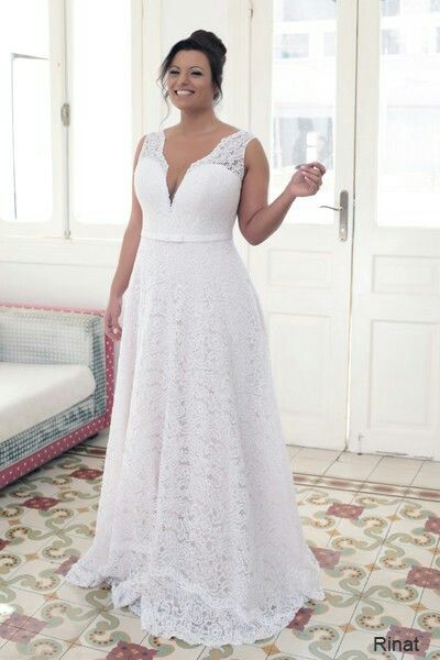 Elegant lace champagne plus size wedding gown creation. Comes with .
