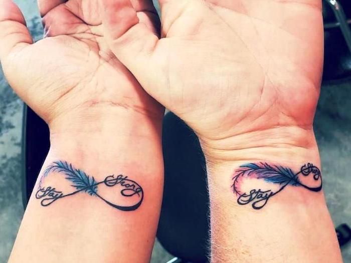 infinity-symbol-stay-strong-feather-mother-and-daughter-tattoos .