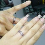 48 Sweet Wedding Ring Tattoos | Ring tattoo designs, Wedding .