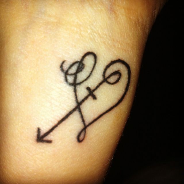 Sagittarius Heart Tattoo want this on the back of my neck .