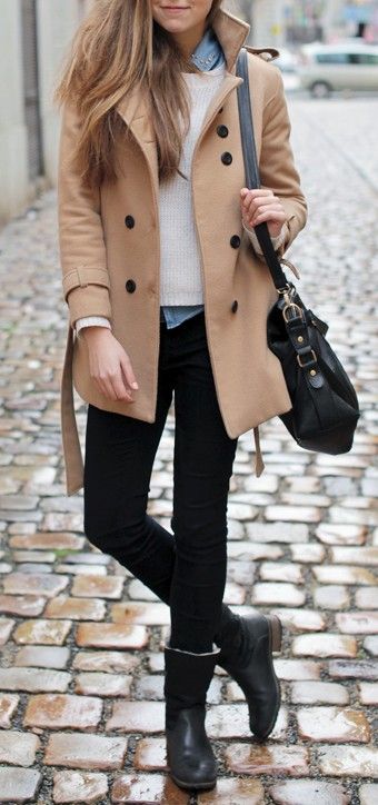 Black skinny pants, ankle boots, cream sweater, chambray button .