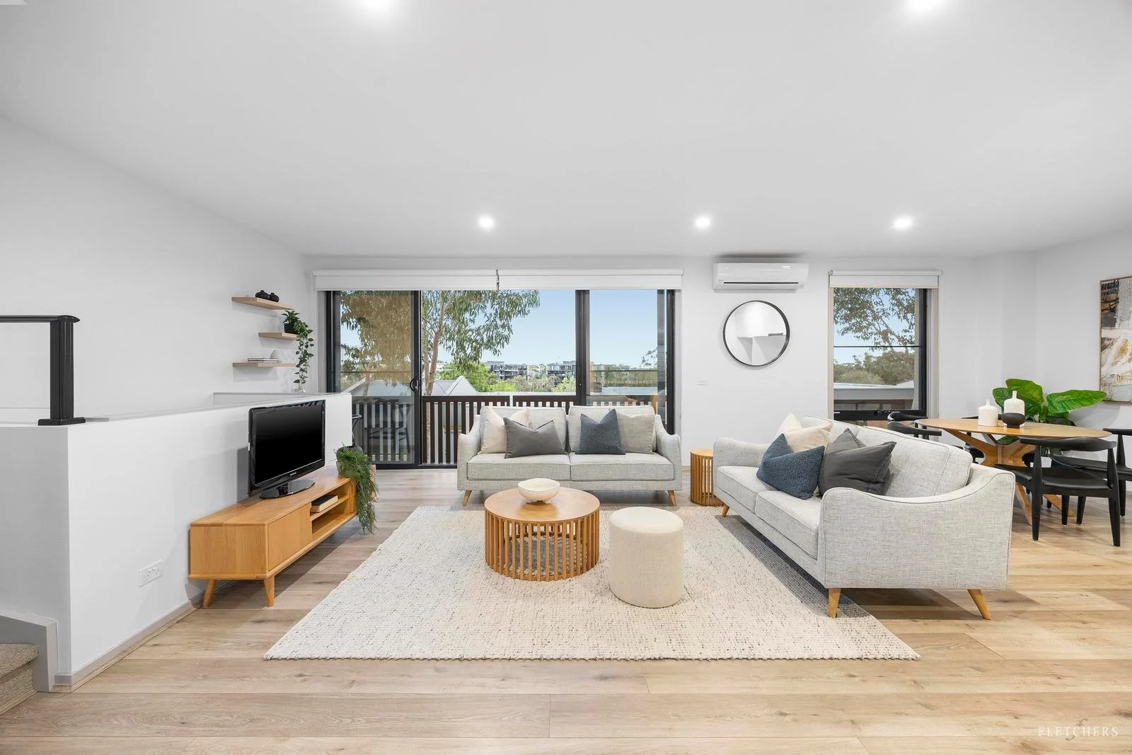 Bright and Airy Minimalist Lounge with Gentle Neutral Hues (Urban Living Room Ideas)