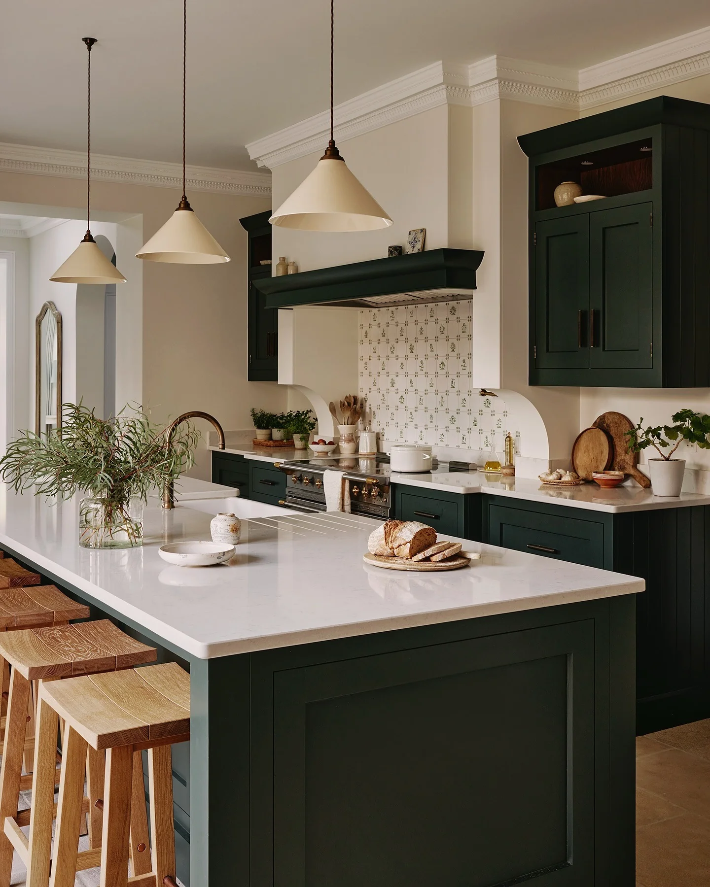 Timeless Dark Green Cabinets Paired with Bright Quartz Surfaces (Barndo Kitchen Ideas)