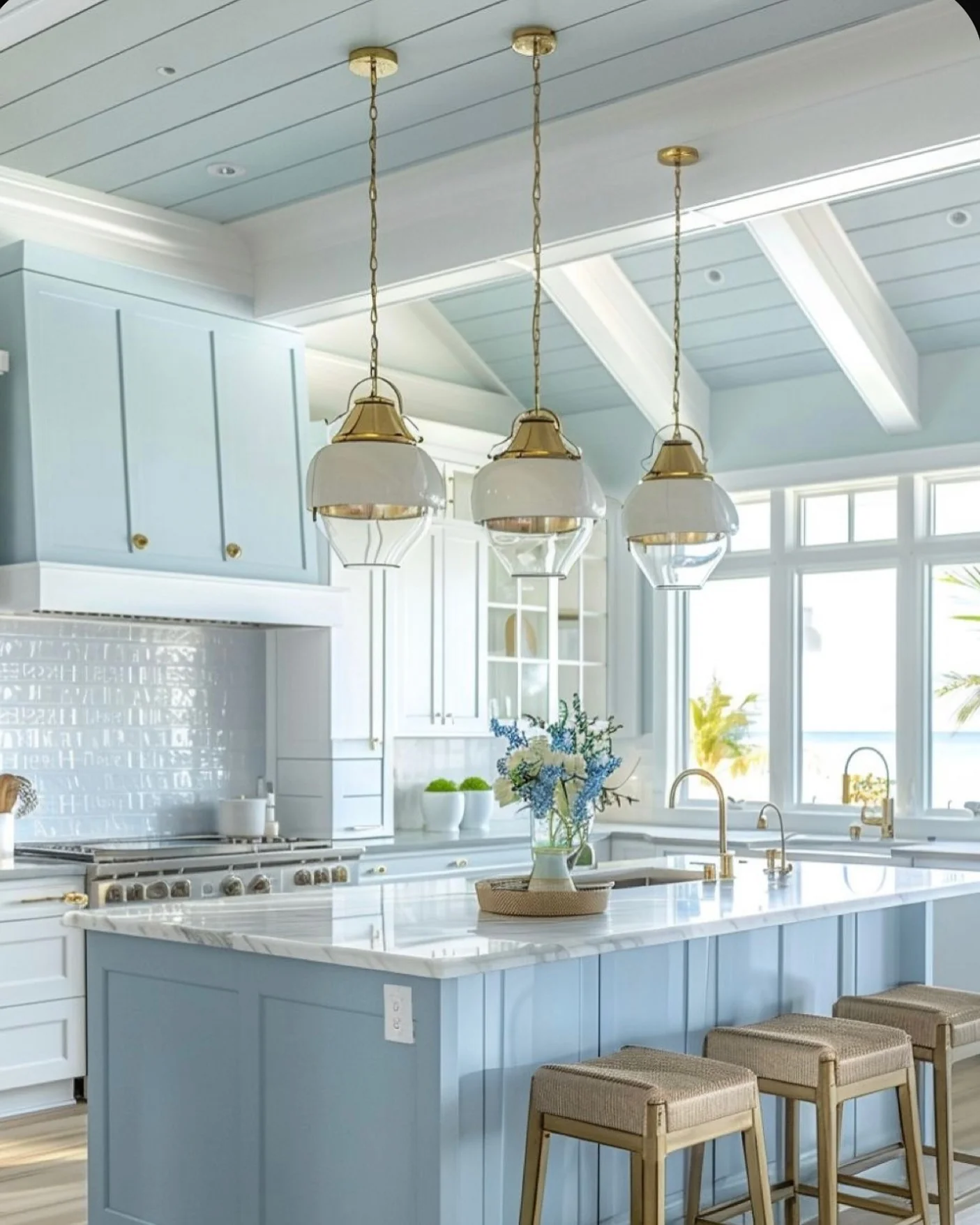 Light Blue Kitchen Accented with Brass Hardware
