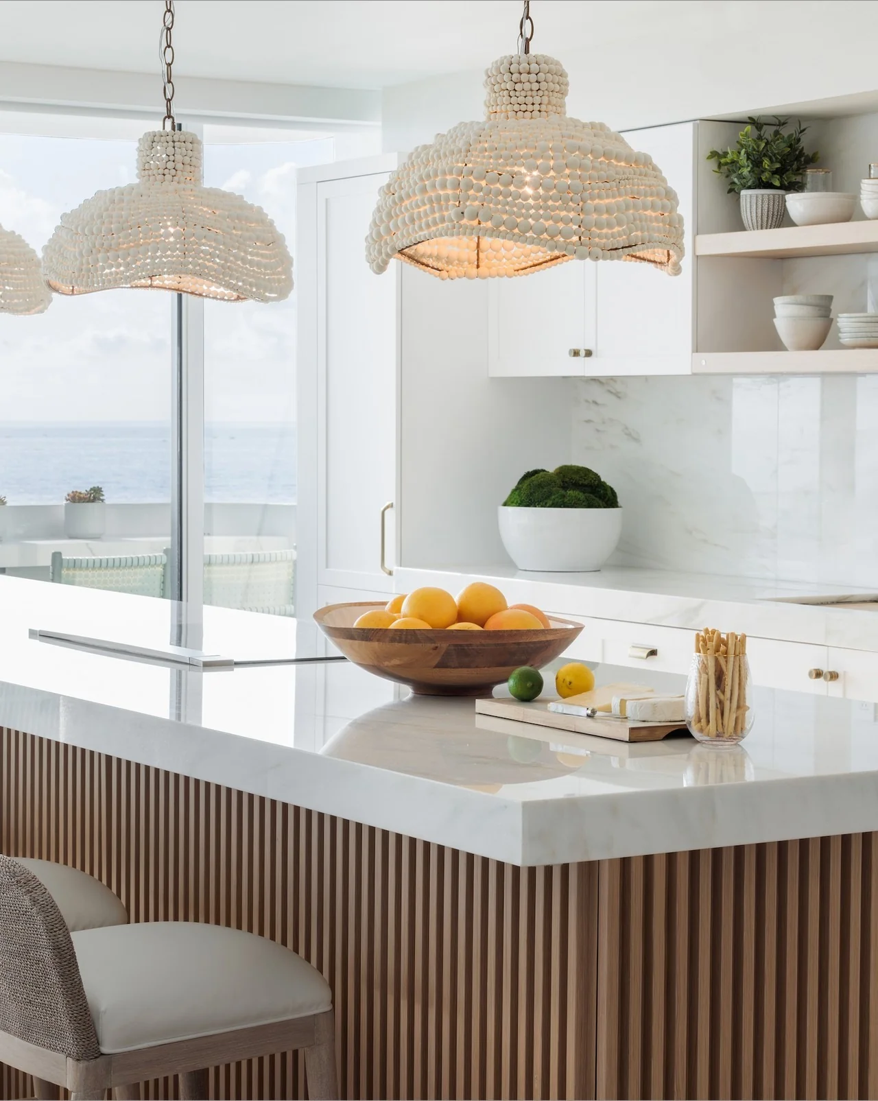 Textured Coastal Kitchen Featuring White and Wood Details