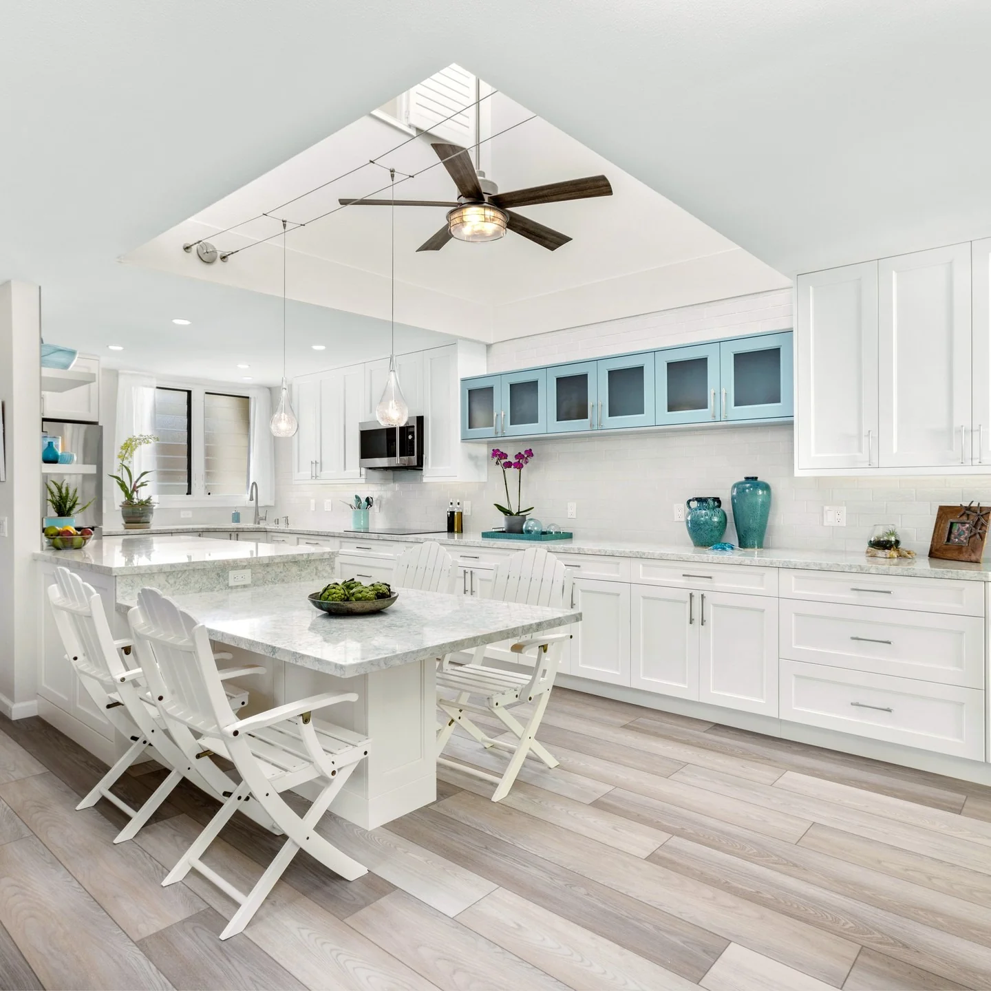 Contemporary Coastal Kitchen Featuring White and Aqua Tones