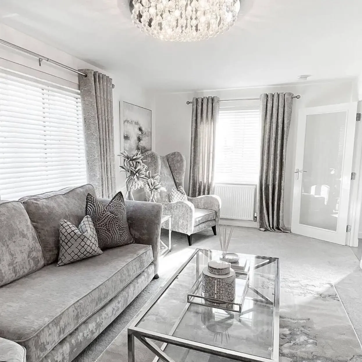 Glamorous Grey Space with Subtle Metallic Highlights (Grey Living Room Ideas)