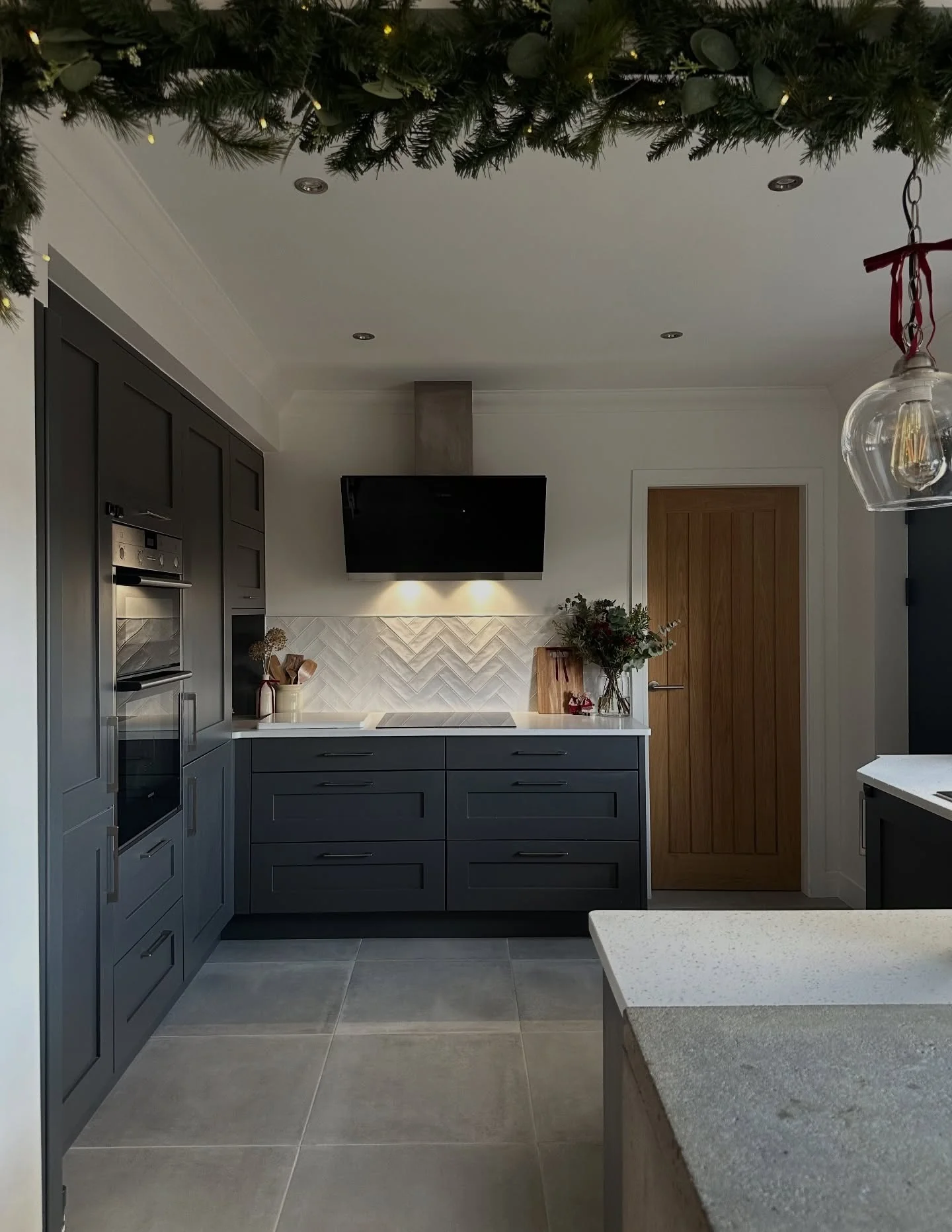 Bold Dark Grey Floors with Charcoal Cabinets