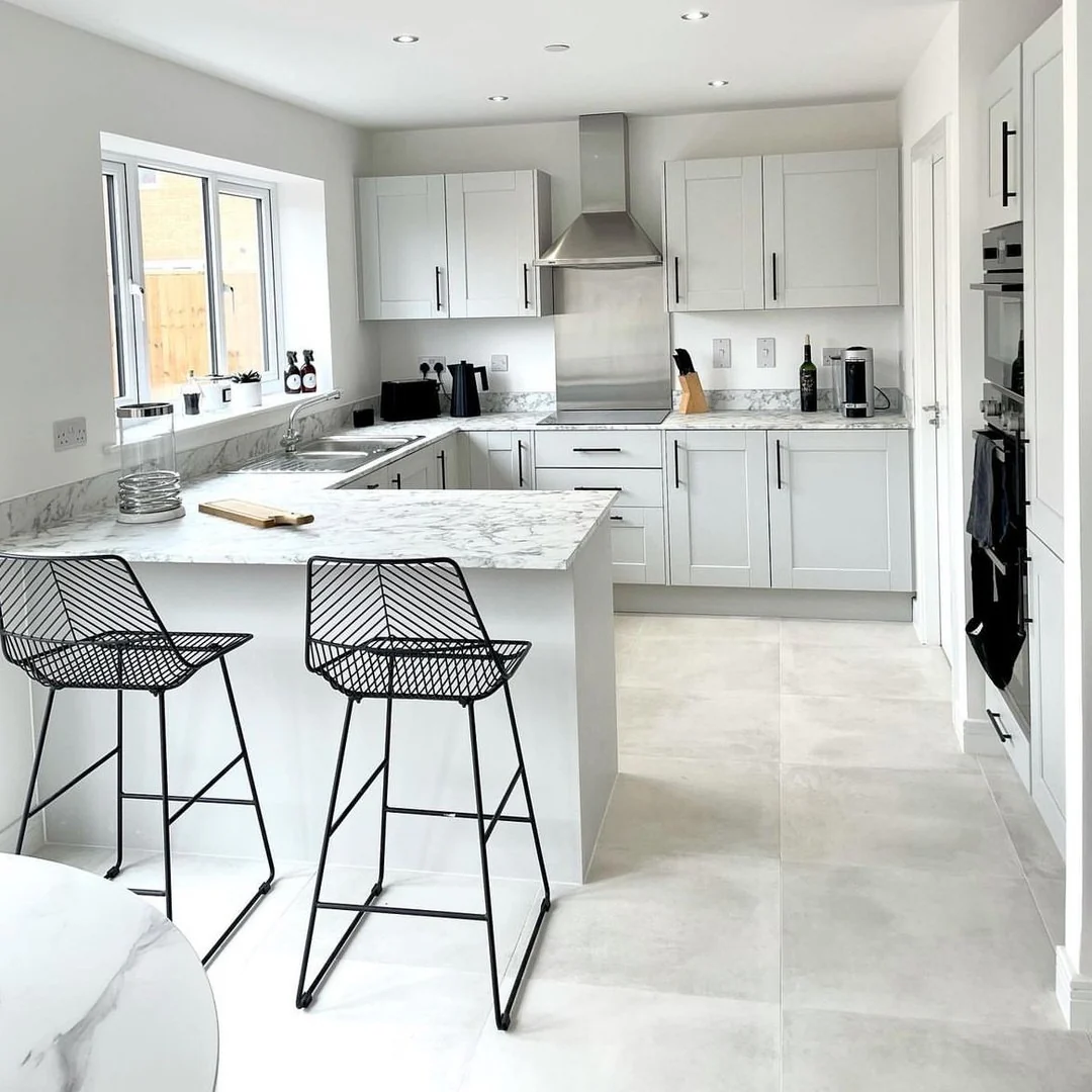 Bright Grey Floors with Crisp White Shaker Cabinets