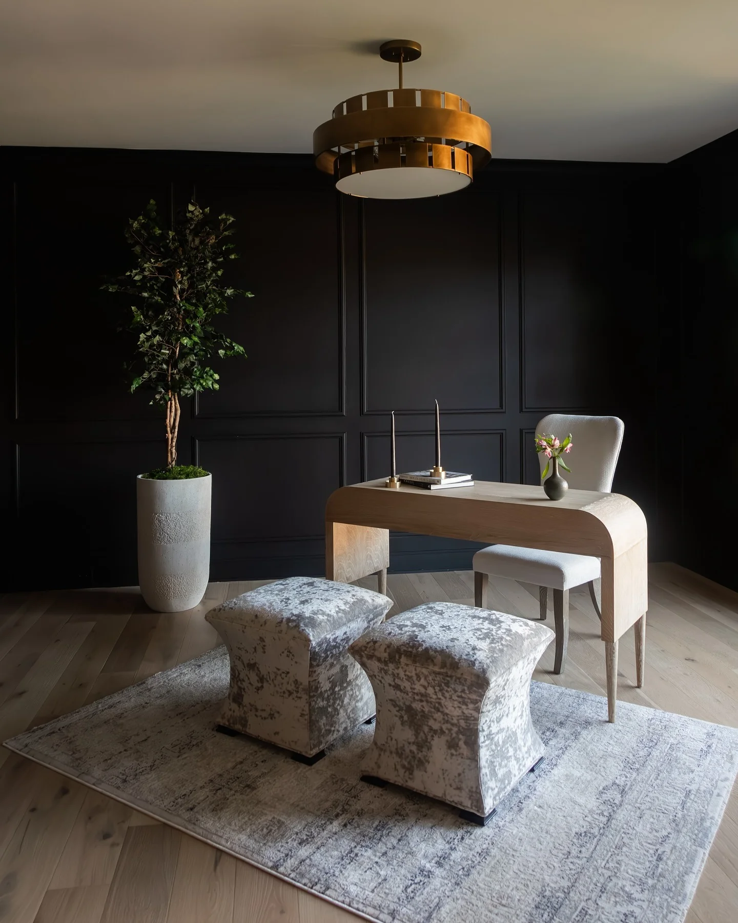 Black Paneled Office with Sculptural Wood Desk