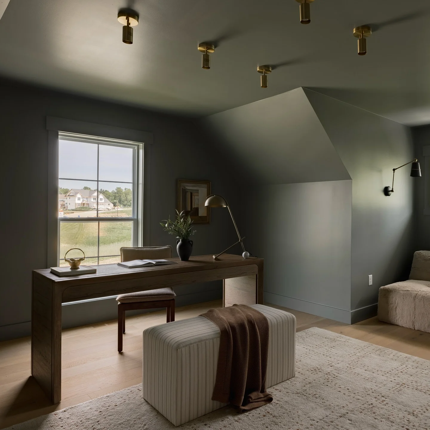 Soft Charcoal Attic Office with Brass Accents
