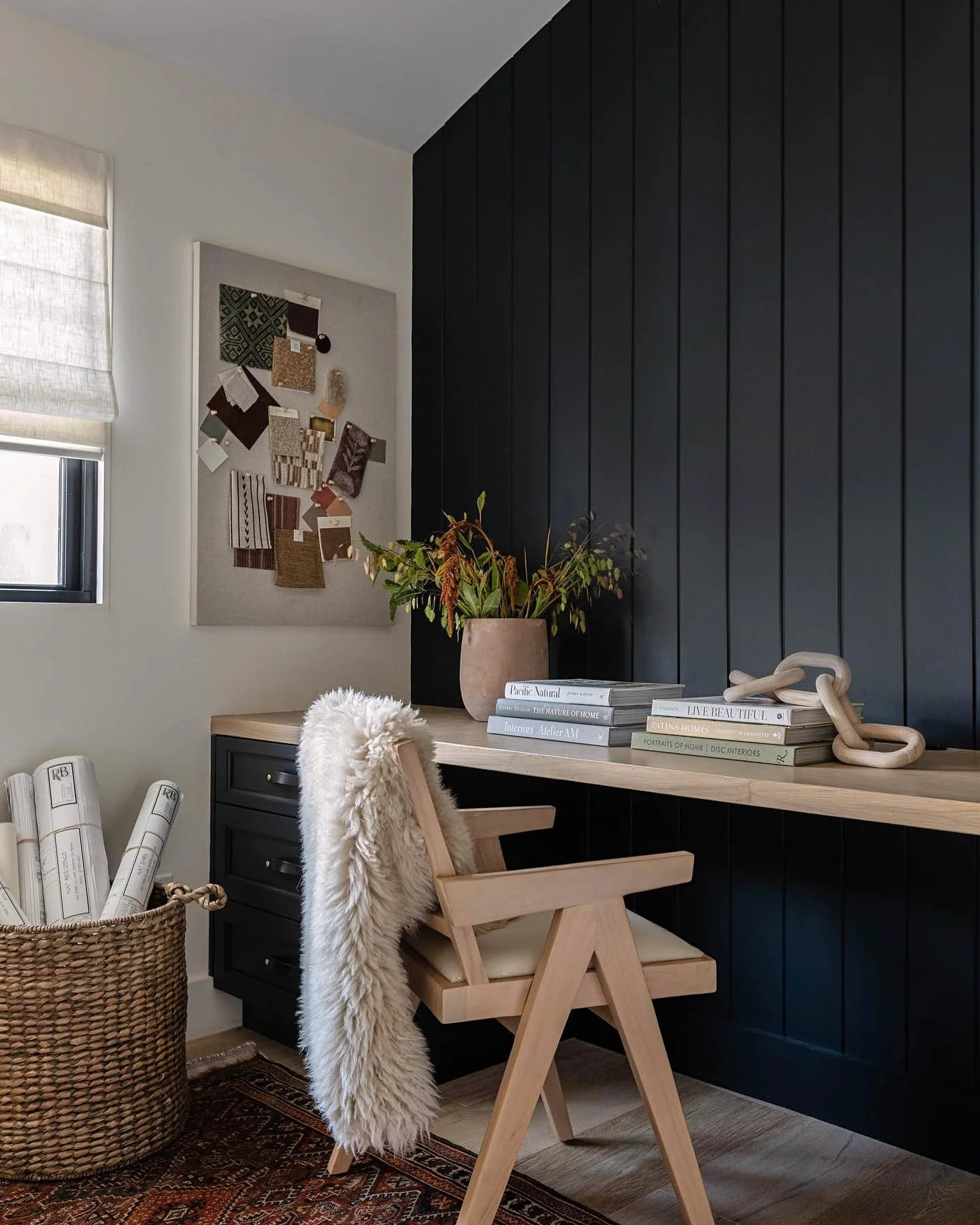 Black Slat Wall Office with Light Wood Furniture
