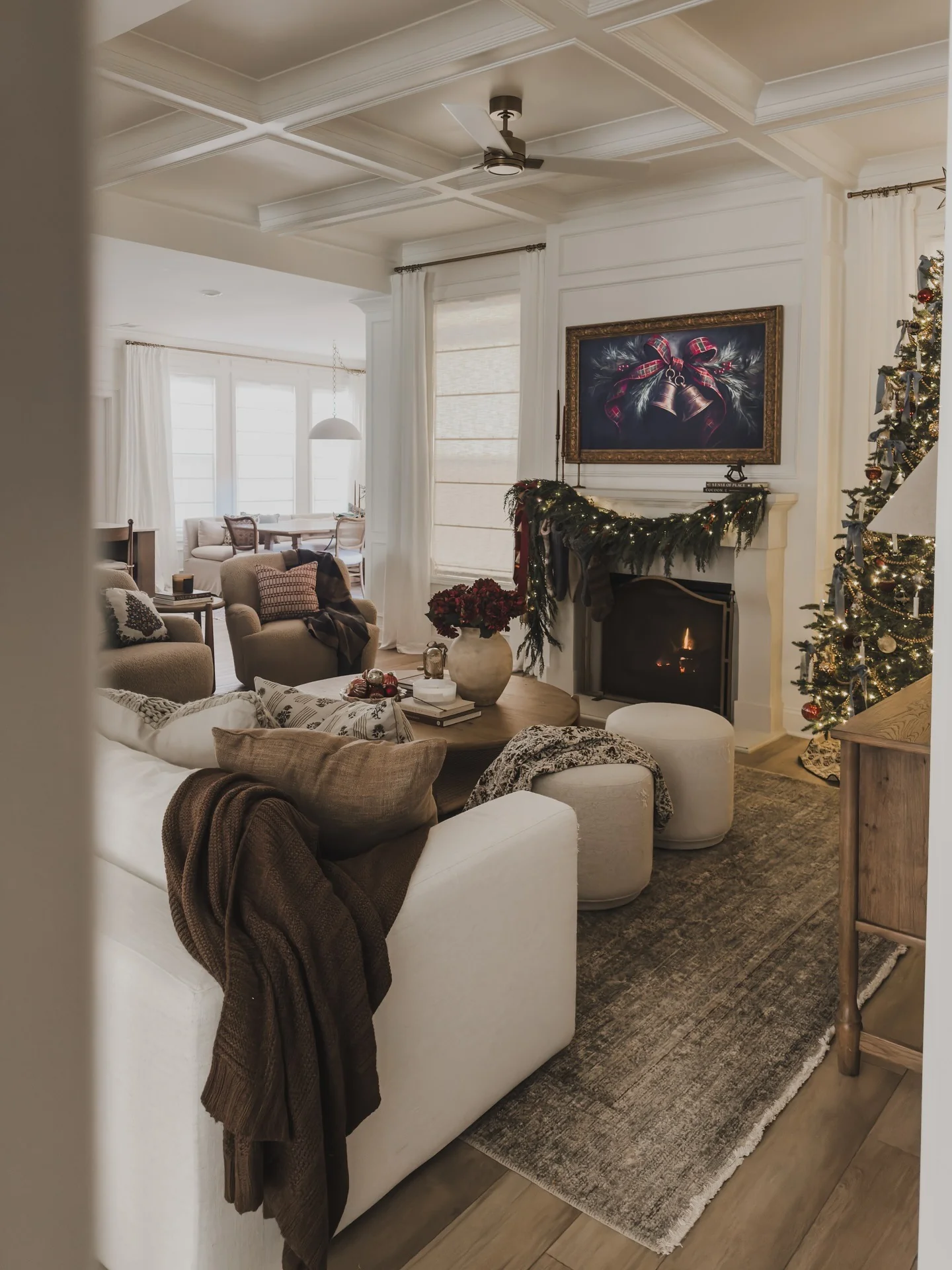 Warm Neutral Rug Anchoring a Holiday Living Room