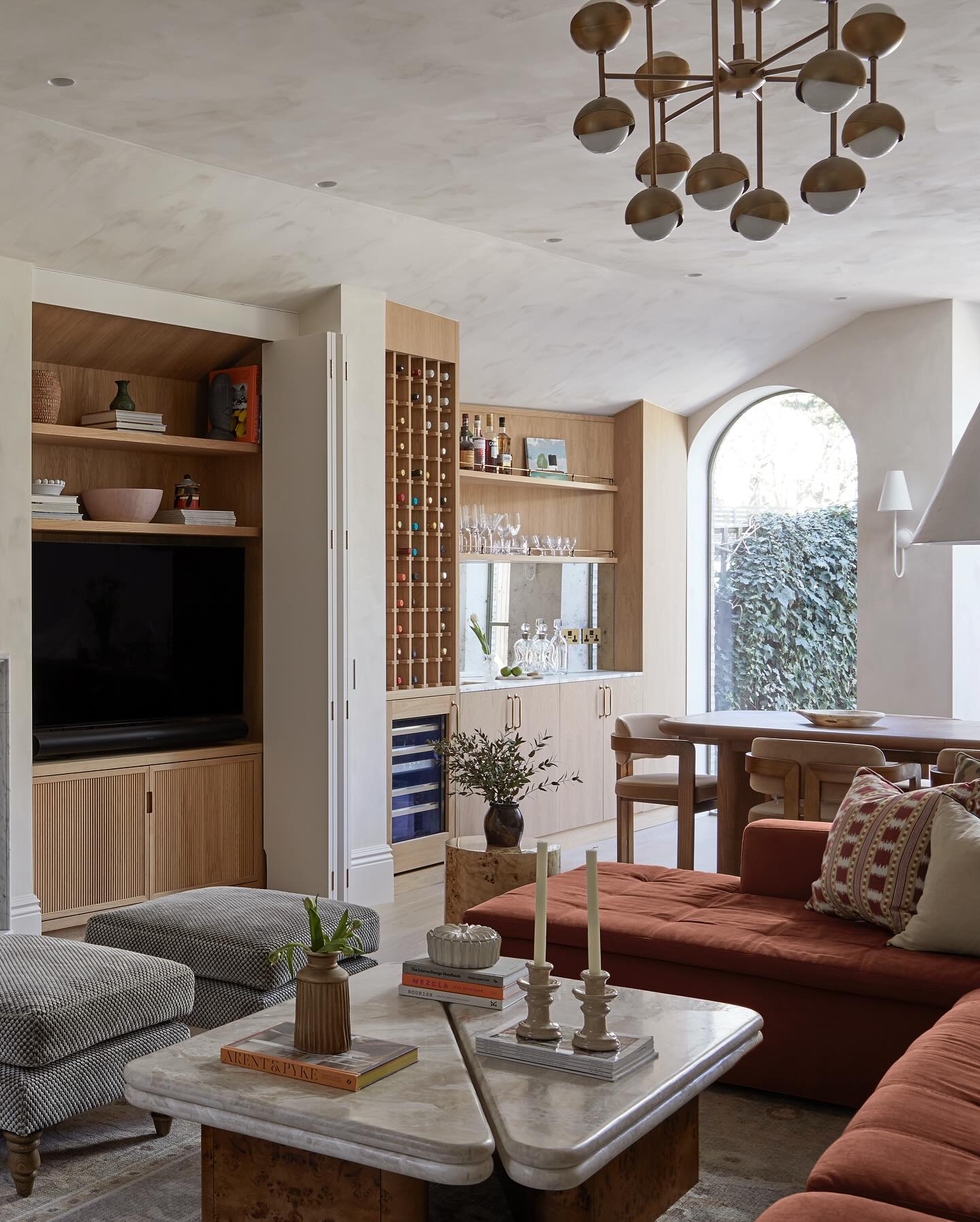 Organic Modern Lounge Featuring Terracotta and Oak Accents