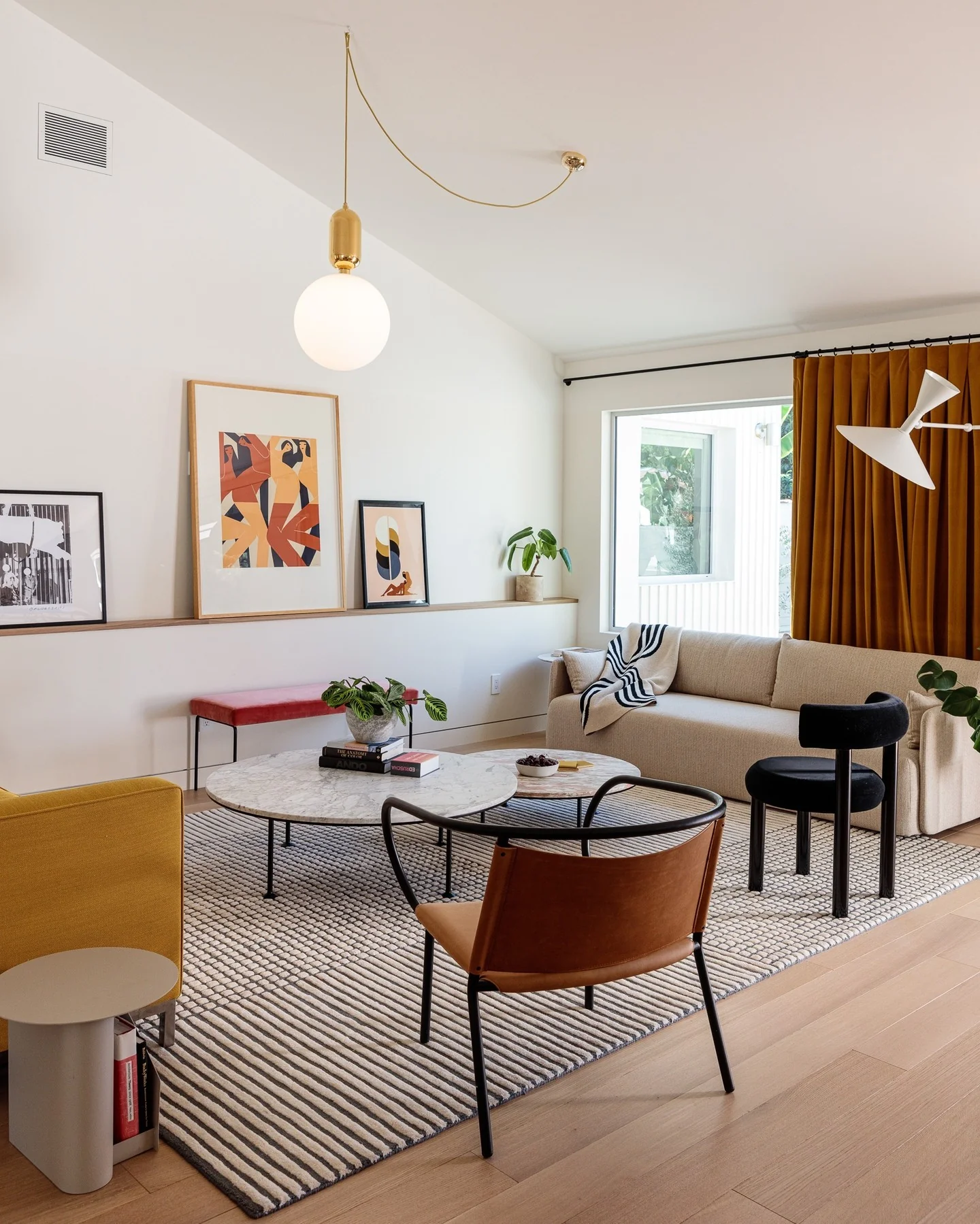 Dynamic Modern Lounge with Mustard and Black Accents