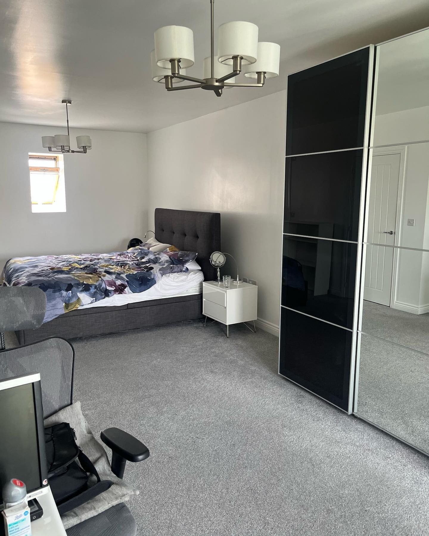 Streamlined Grey Bedroom with Modern Fixtures