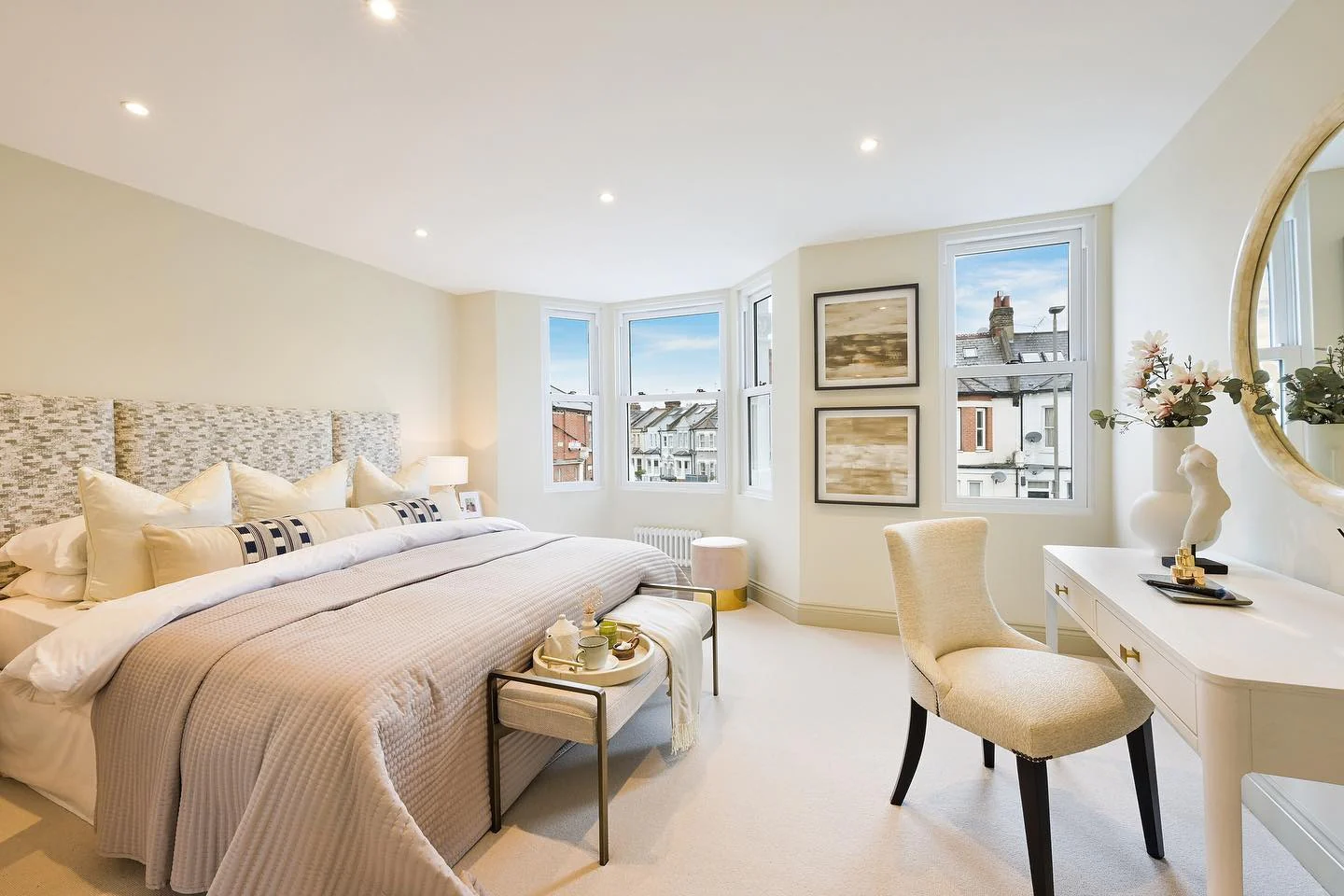 Light-Filled Contemporary Bedroom with Gold Touches