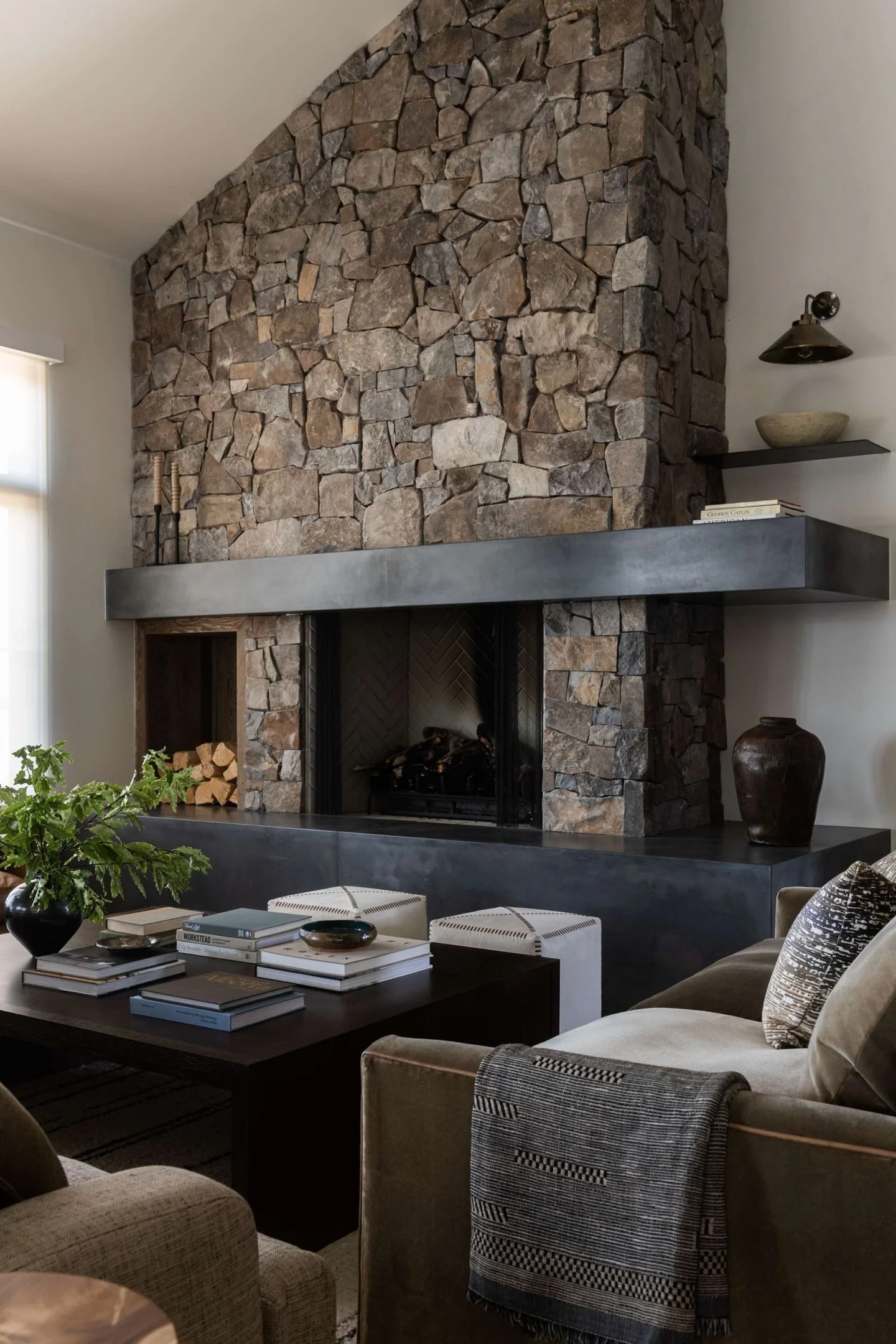 Contemporary Mountain Retreat with Charcoal Highlights (Stone Fireplace Living Room Ideas)