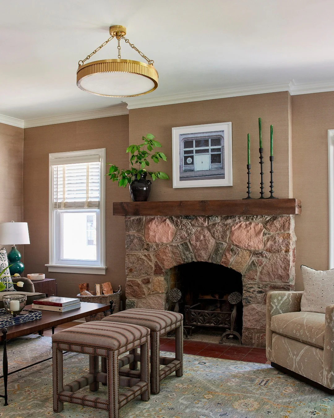 Cozy Cottage Vibes with Earthy Browns and Greens (Stone Fireplace Living Room Ideas)