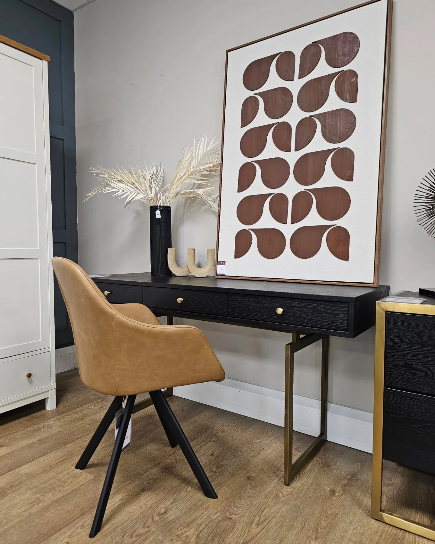 Black Wood Desk with Brass Legs and Cozy Camel Seating