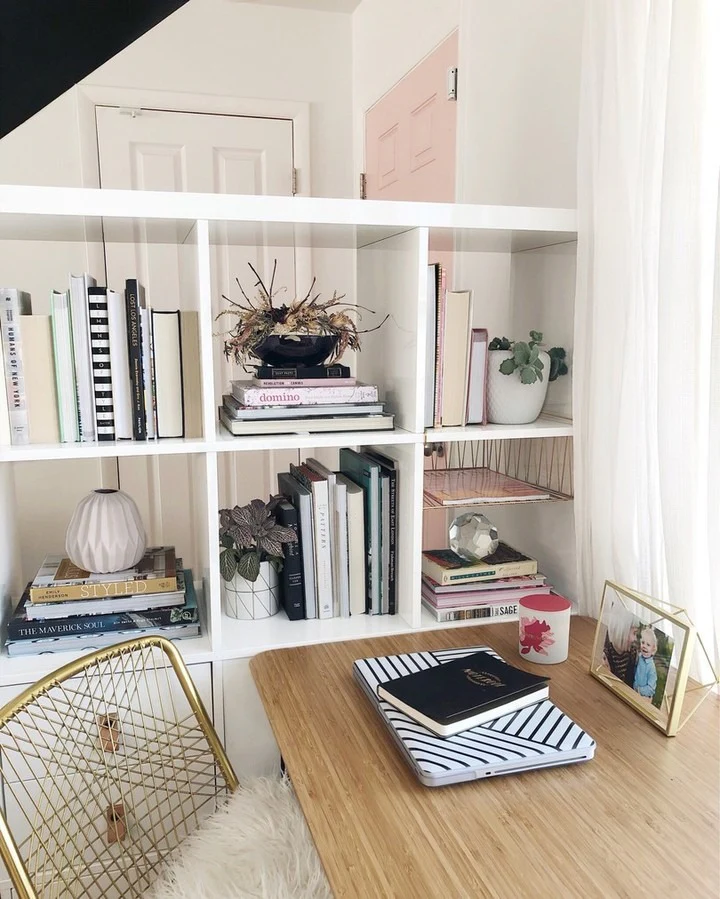 Bamboo Desk Surrounded by Books and Brass Details (Tiny Home Office Ideas)