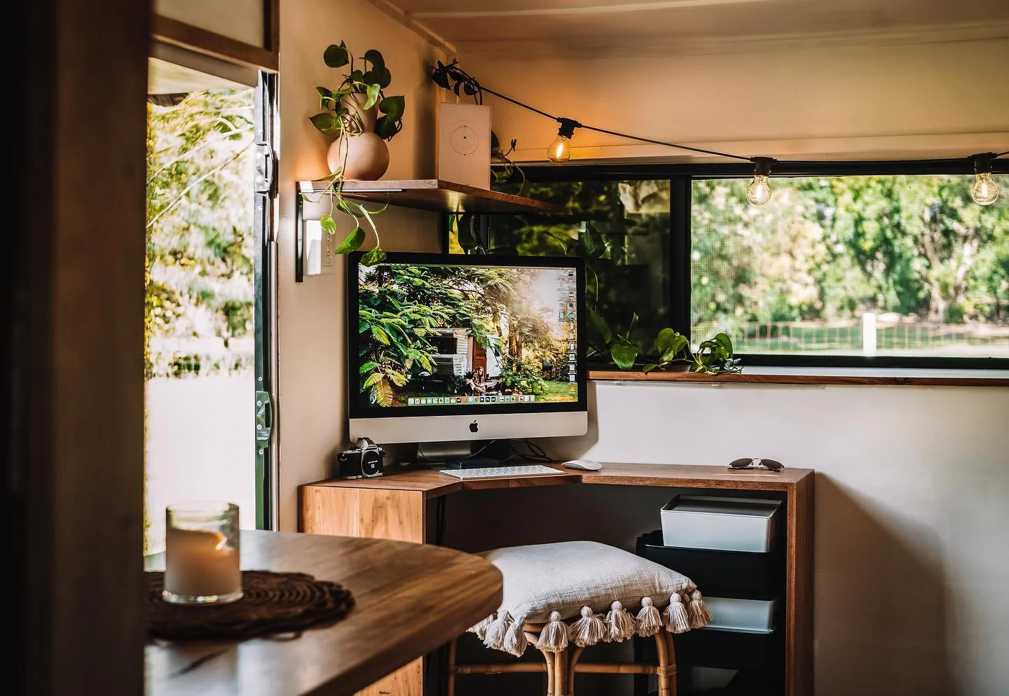 Corner Workspace with Warm Wood and Abundant Greenery (Tiny Home Office Ideas)